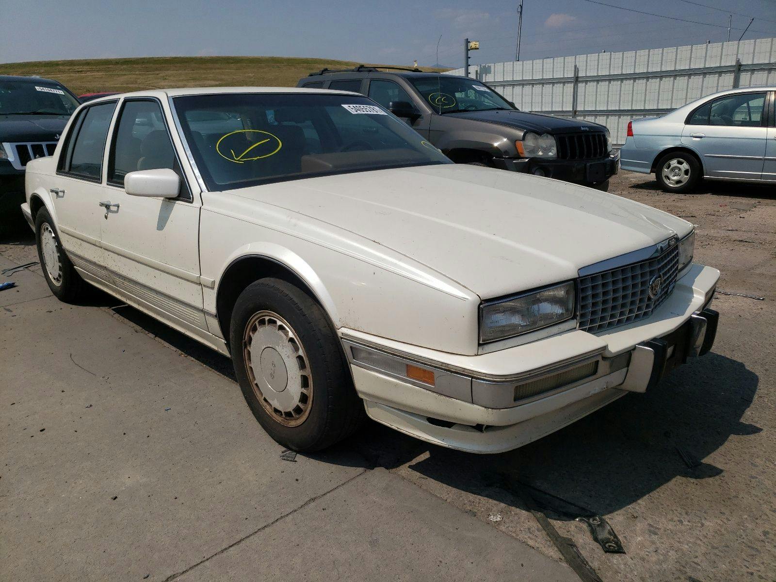 main view of 1G6KY5338LU806558 Cadillac Seville 1990